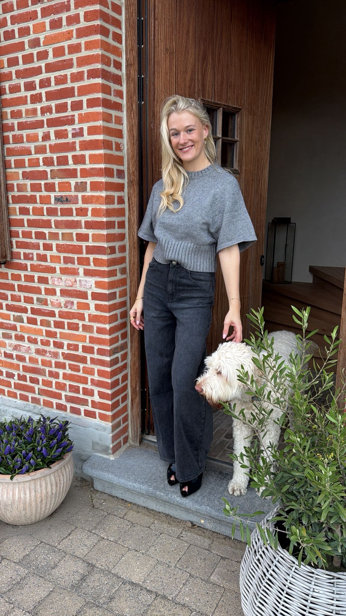 Grey knitted sweater with round neck