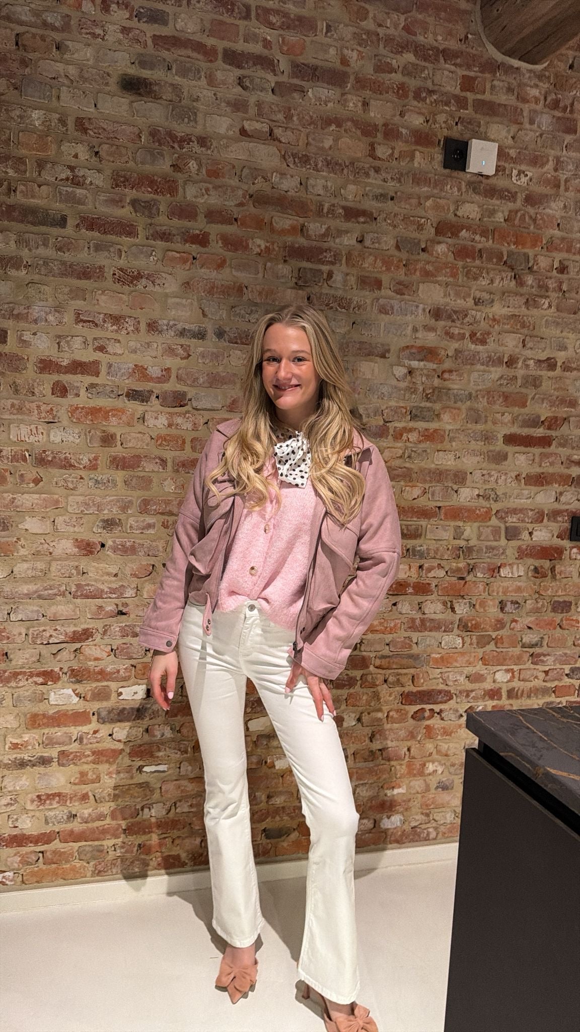 Cardigan with a polka dot bow